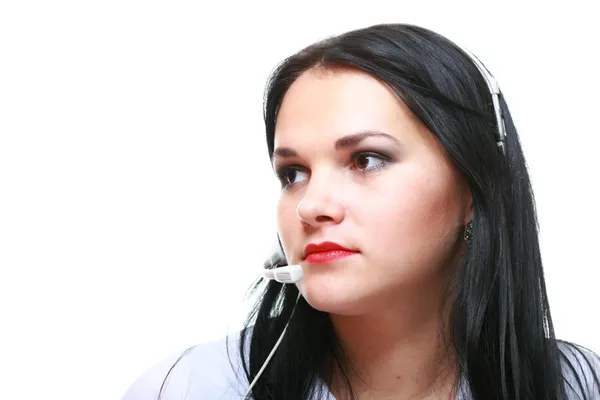 Chica morena joven con auriculares Imágenes de stock libres de derechos