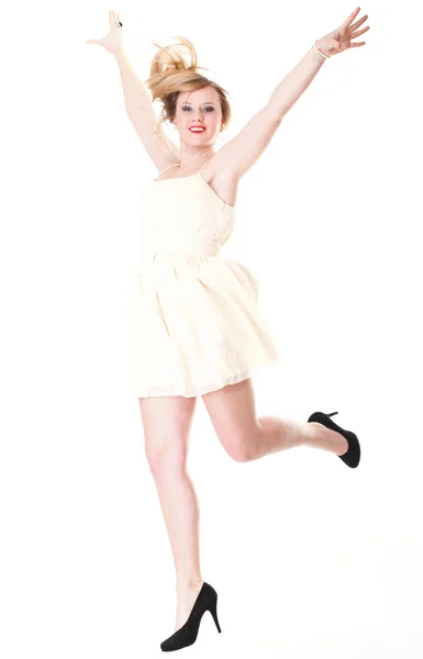 Genç kadın mutlu kadın kolları yukarı izole atlama — Stok fotoğraf