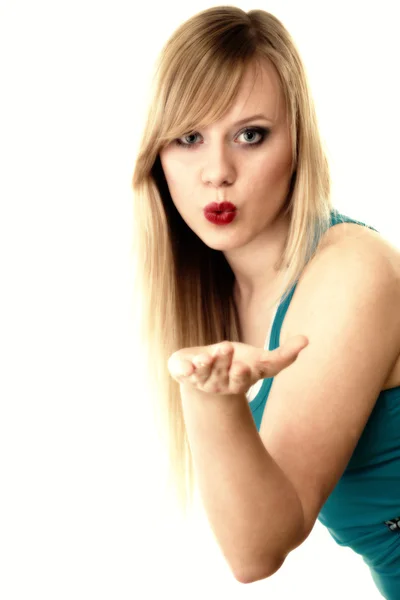 Beautiful young woman blowing a kiss — Stock Photo, Image