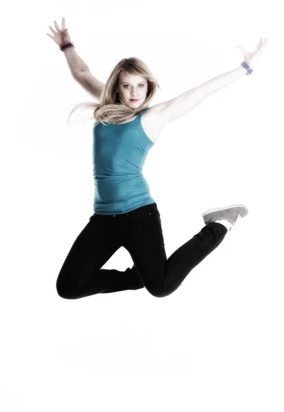 Młoda kobieta kobieta szczęśliwy skoki z broni się na białym tle — Zdjęcie stockowe