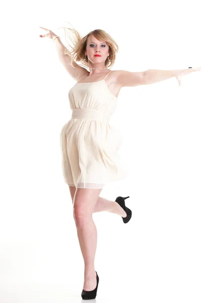Młoda kobieta kobieta szczęśliwy skoki z broni się na białym tle — Zdjęcie stockowe