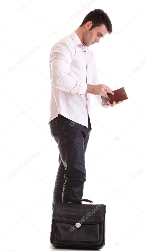 Business man looking at his empty wallet Isolated