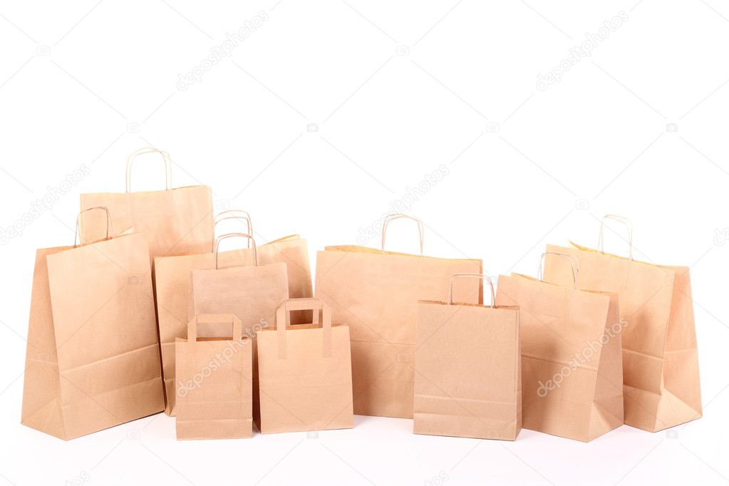 Shopping brown gift bags isolated