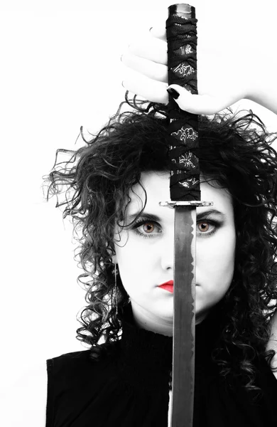 Portrait curly woman curly girl and sword — Stock Photo, Image