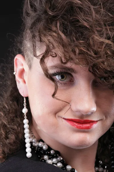 Ear super piercing woman curly girl — Stock Photo, Image