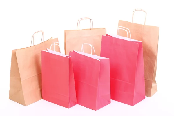 Shopping rouge sacs-cadeaux écologiques isolés — Photo