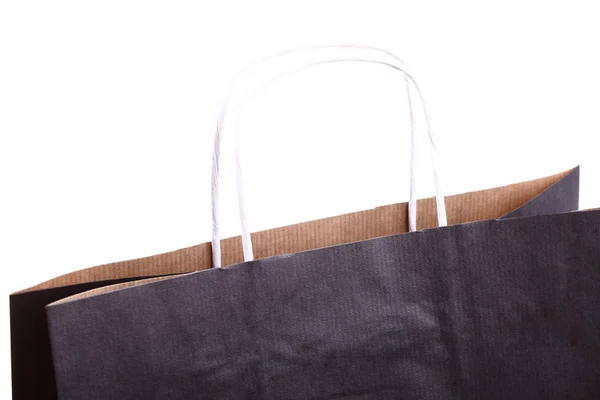 购物黑色礼品袋和孤立的苹果 — 图库照片