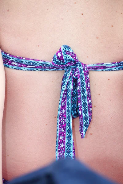 stock image Knot of bikini on a woman