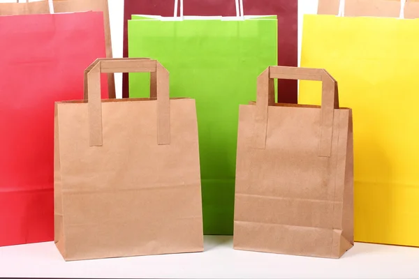 Shopping brun sacs-cadeaux fond — Photo