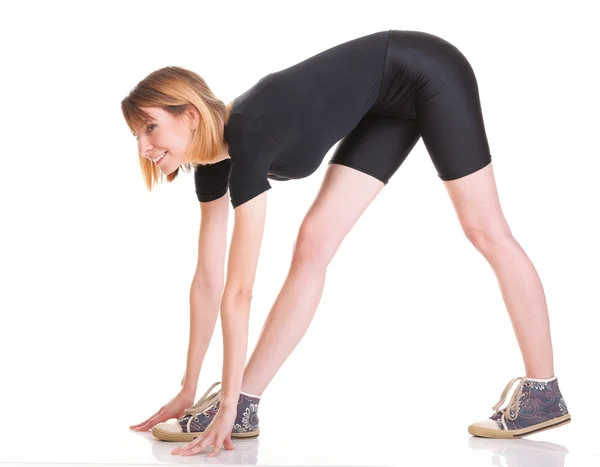 Deporte Mujer joven haciendo ejercicio aislado en blanco —  Fotos de Stock
