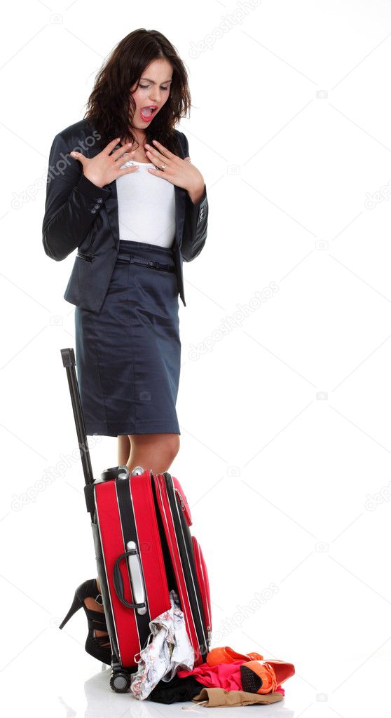Full length young business woman to late red travel bagd