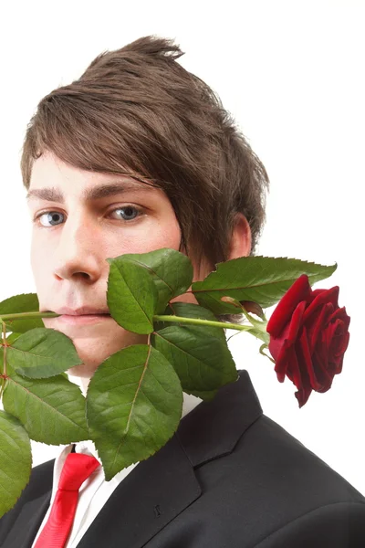 Jonge man, bloem, rode rose geïsoleerd — Stockfoto