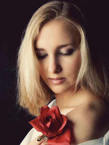 stock image Portrait of a Slavic girl blonde on a dark background