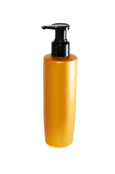 stock image Yellow shampoo bottle out on a white background