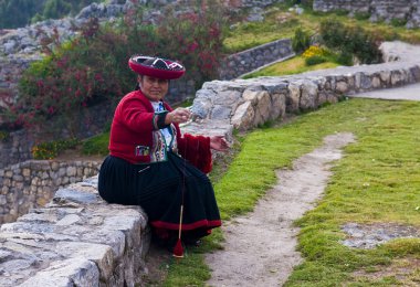 Peruvian woman weaving clipart