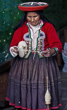 Peruvian woman weaving clipart