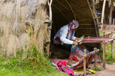 Peruvian man weaving clipart