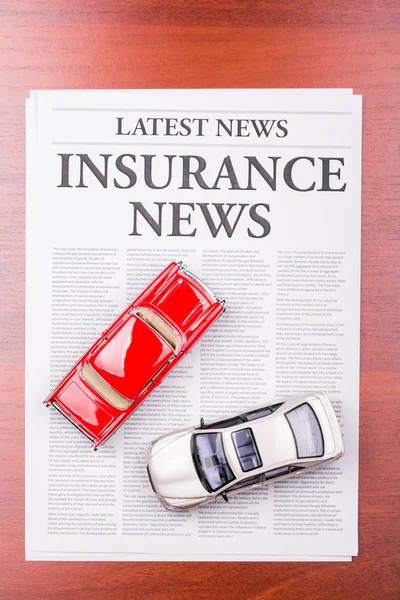 The newspaper INSURANCE NEWS and auto — Stock Photo, Image