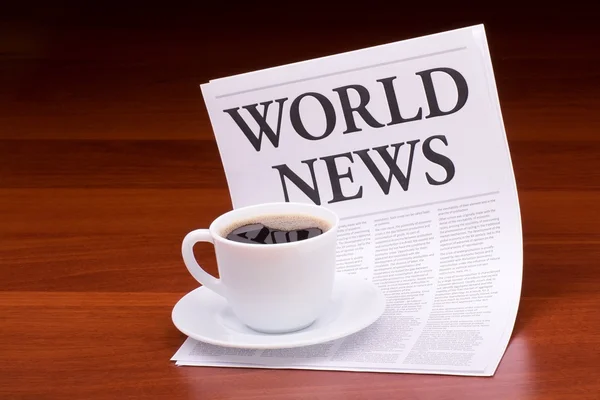 O jornal LATEST NEWSwith the headline WORLD NEWS — Fotografia de Stock