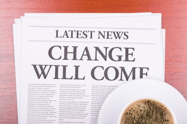 The newspaper CHANGE WILL COME and coffee clipart