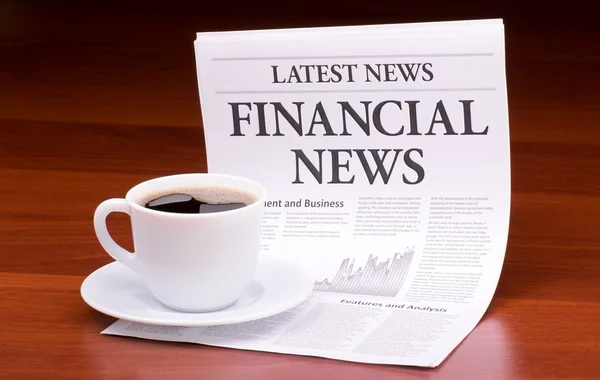 De krant laatste nieuws met de kop financieel nieuws — Stockfoto