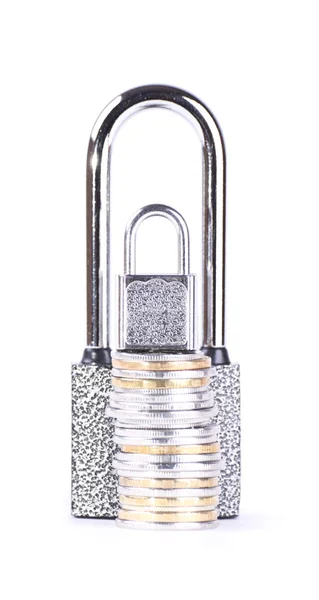 Two padlocks and a stack of coins — Stock Photo, Image