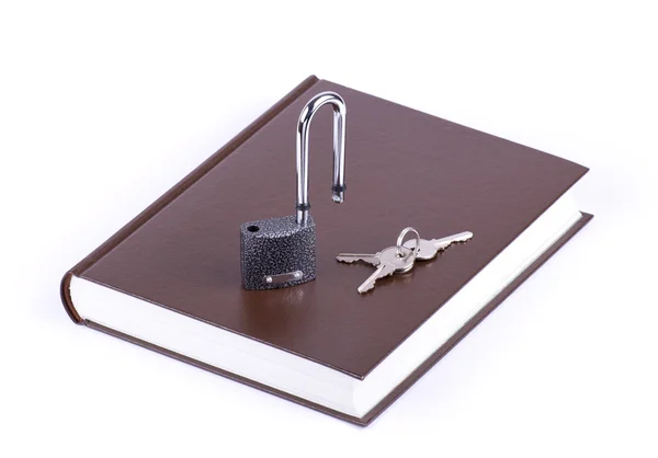 Braunes Buch, Schlüssel und offenes Vorhängeschloss — Stockfoto