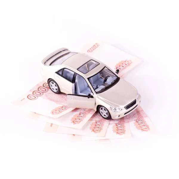 Modele samochodów i pięć banknotów — Zdjęcie stockowe