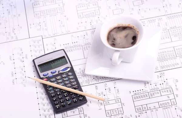 Calculator, pancil and cup of coffee — Stock Photo, Image