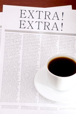Newspaper EXTRA and a cup of coffee clipart