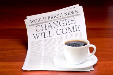 Newspaper and cup of coffee clipart