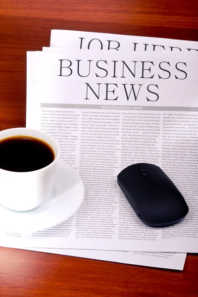 Business newspaper, cup of coffee and mouse — Stock Photo, Image