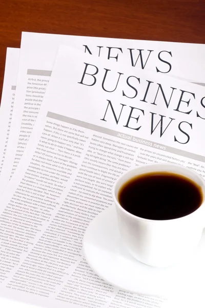 Several newspapers and cup of coffee — Stock Photo, Image
