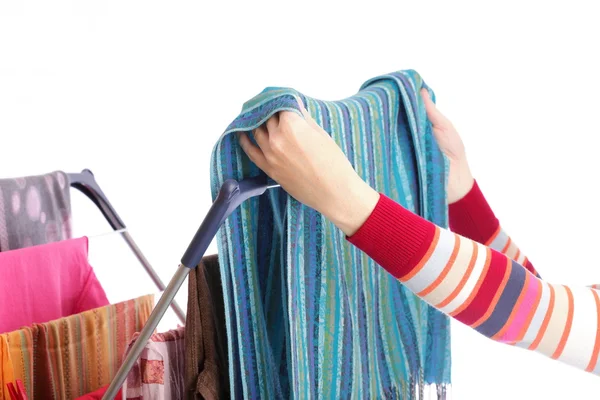 Secadora de ropa y mano de mujer aislada en blanco — Foto de Stock
