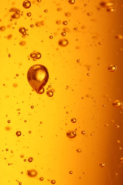 Soap bubbles orange liquid — Stock Photo, Image