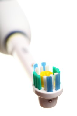 Electrical toothbrush isolated on white clipart