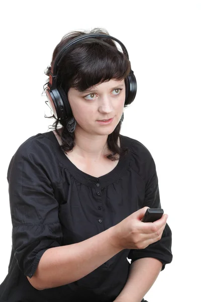 Usmívající se žena se sluchátky — Stock fotografie
