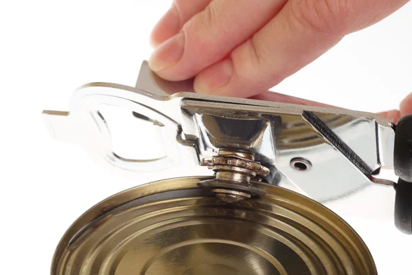 Can with can opener hand — Stock Photo, Image