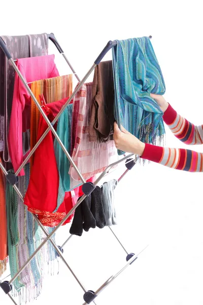 Secador de roupa e mão mulher isolado em branco — Fotografia de Stock