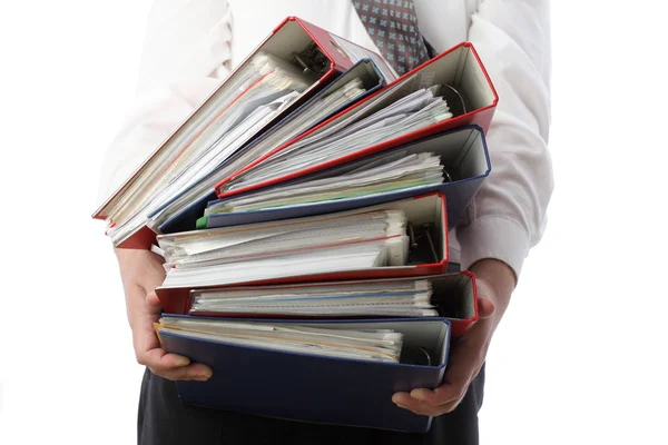 Man holding stack of folders - Isolated Stock Photo