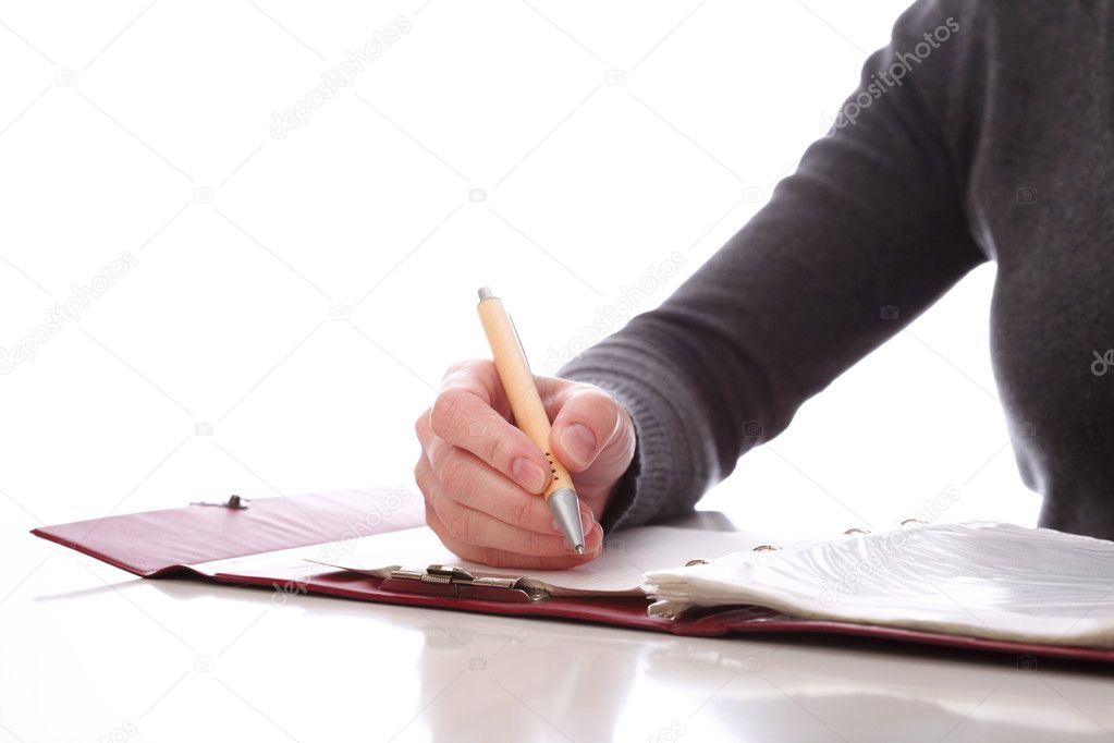 Woman write by pen on paper . Isolated on white background