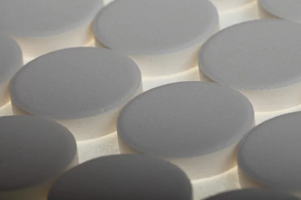 White big pills background — Stock Photo, Image