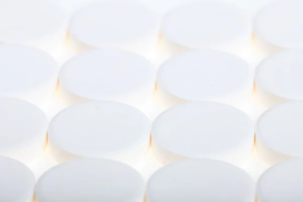 Blanco grandes píldoras fondo — Foto de Stock
