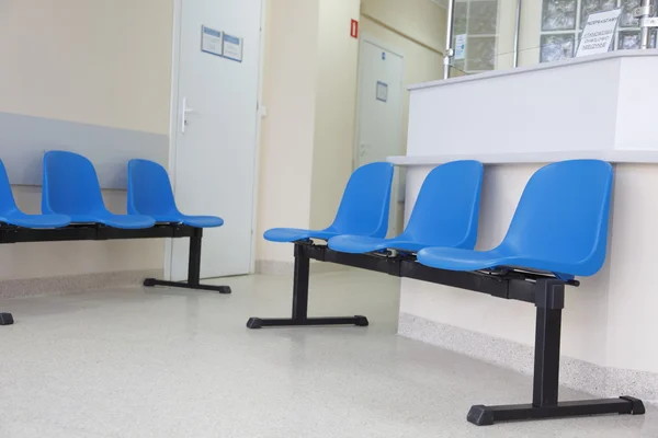 stock image Waiting room blue chairs on the floor