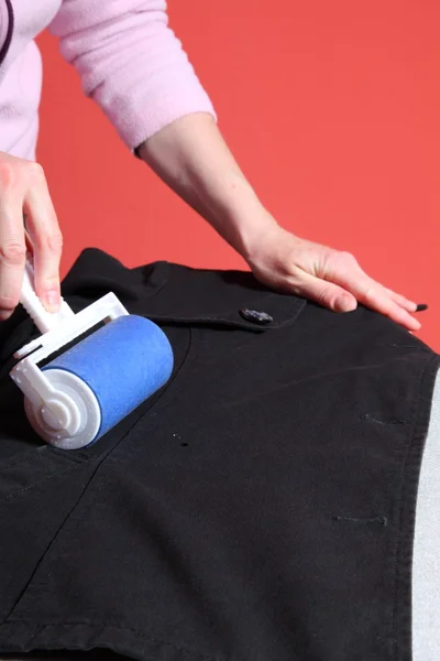 Cleaning dust with lint roller — Stock Photo, Image