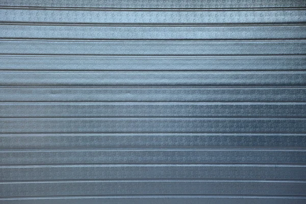 Fondo de puerta de rodillo de seguridad gris — Foto de Stock