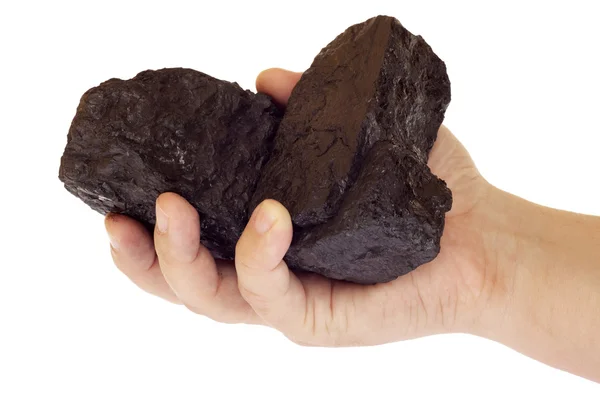 Carbone, pepite di carbonio isolate in mano — Foto Stock
