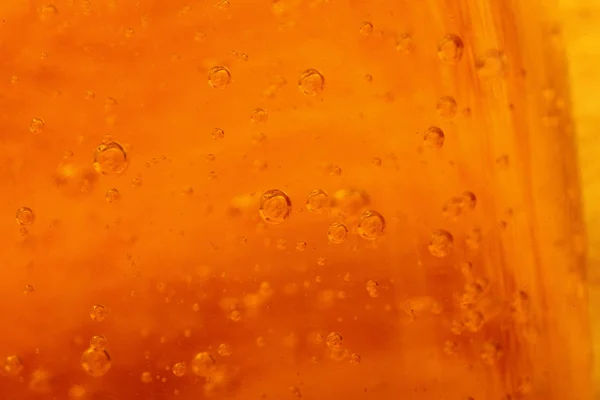 stock image Soap bubbles orange liquid