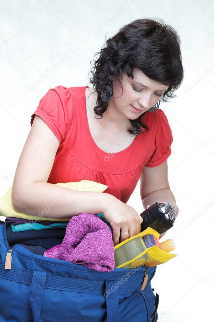 Woman packing bags