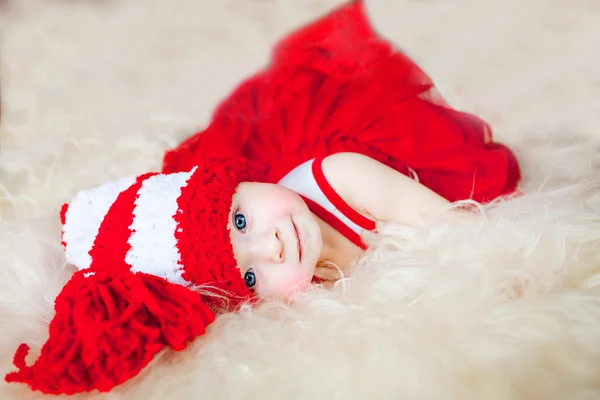 Cute little girl in the New Year bell — Stock Photo, Image